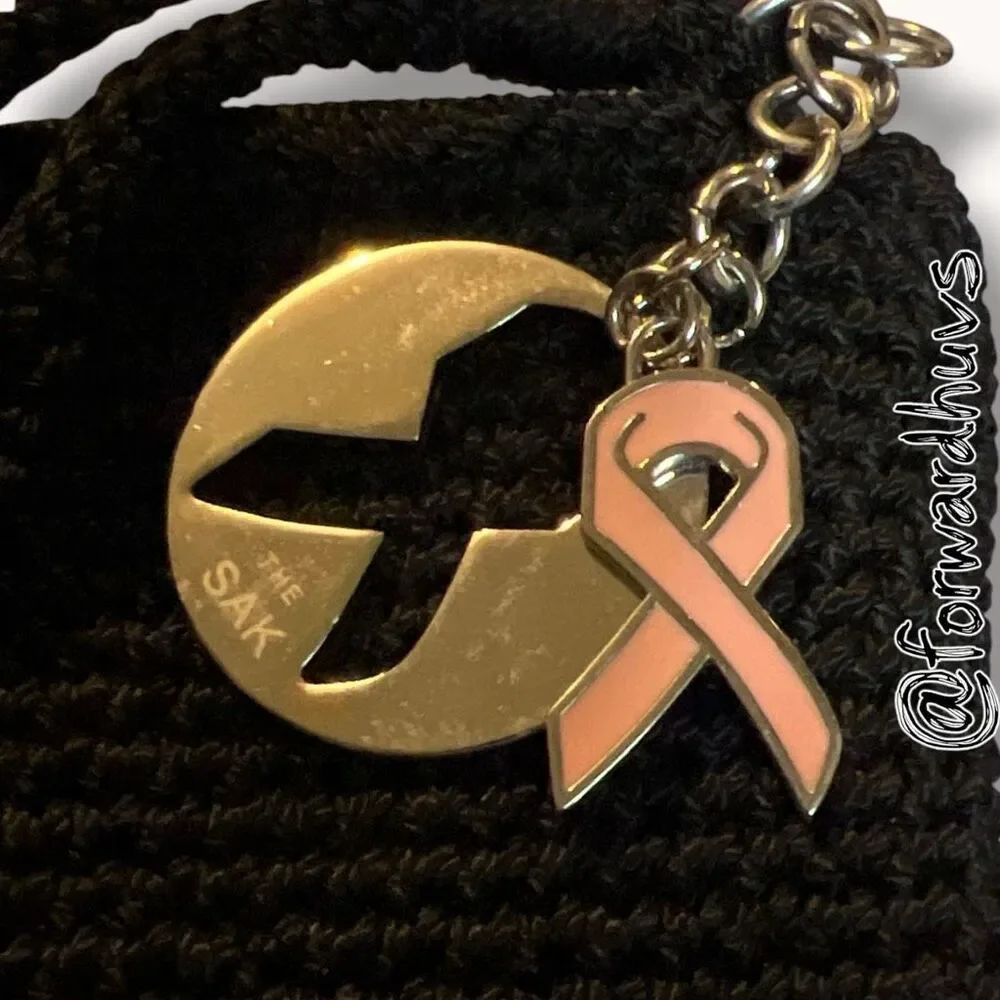 The Sak Black Crochet Wristlet Coin Purse Pink Ribbon Charm